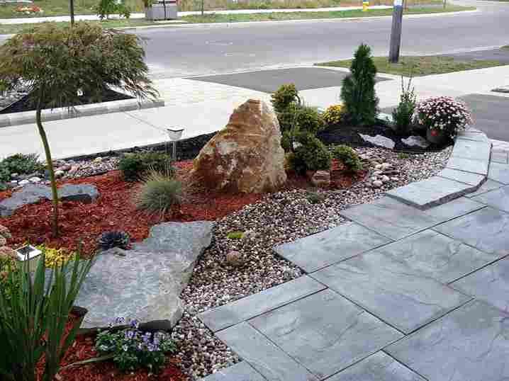 Learn what hardscape does for drainage, structure, and property value, and why it matters for Ithaca's climate and terrain.