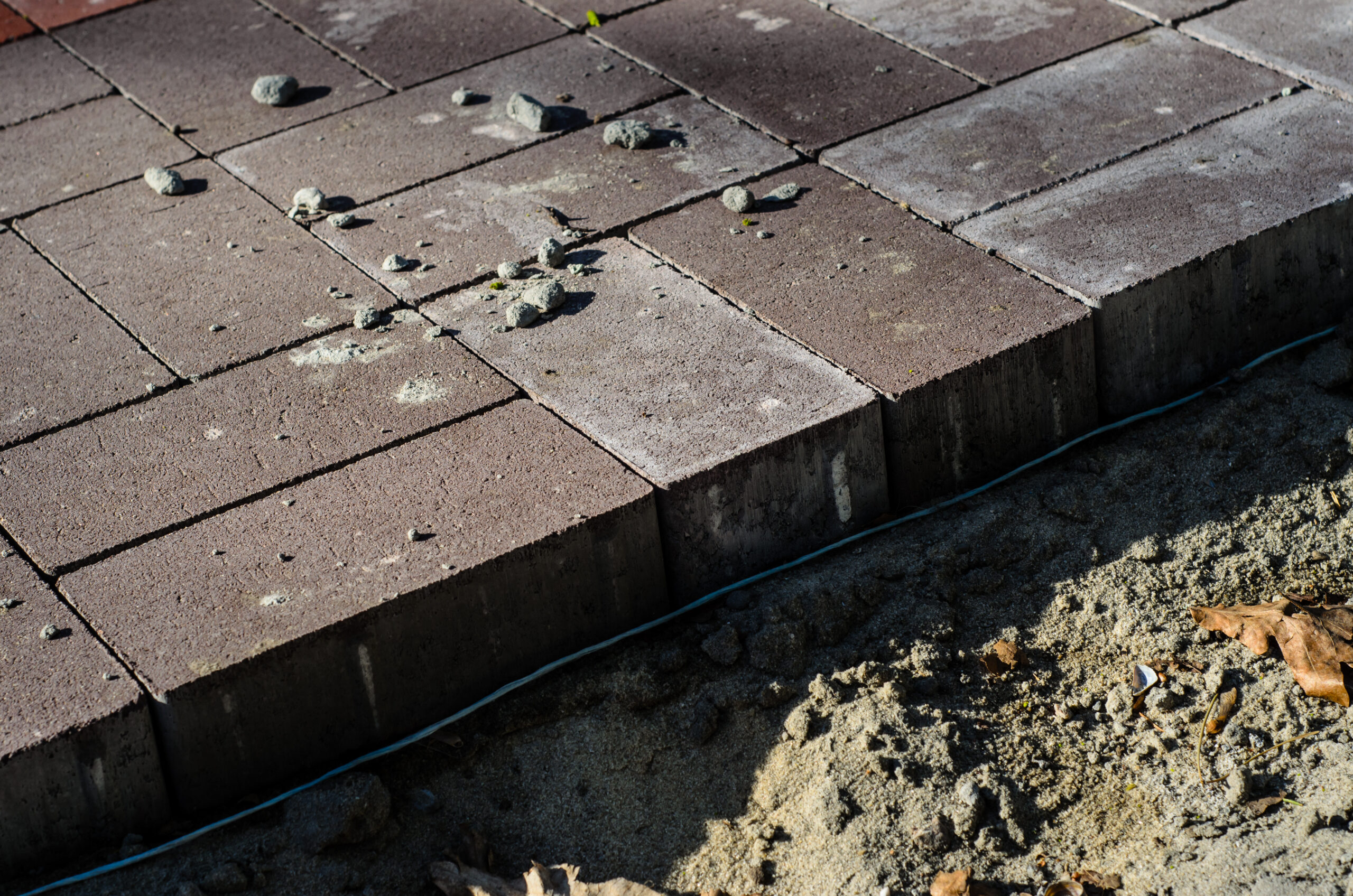 Comparing porcelain and concrete patio slabs? Find out which patio slabs are best for Ithaca, NY winters, with real performance and cost differences.